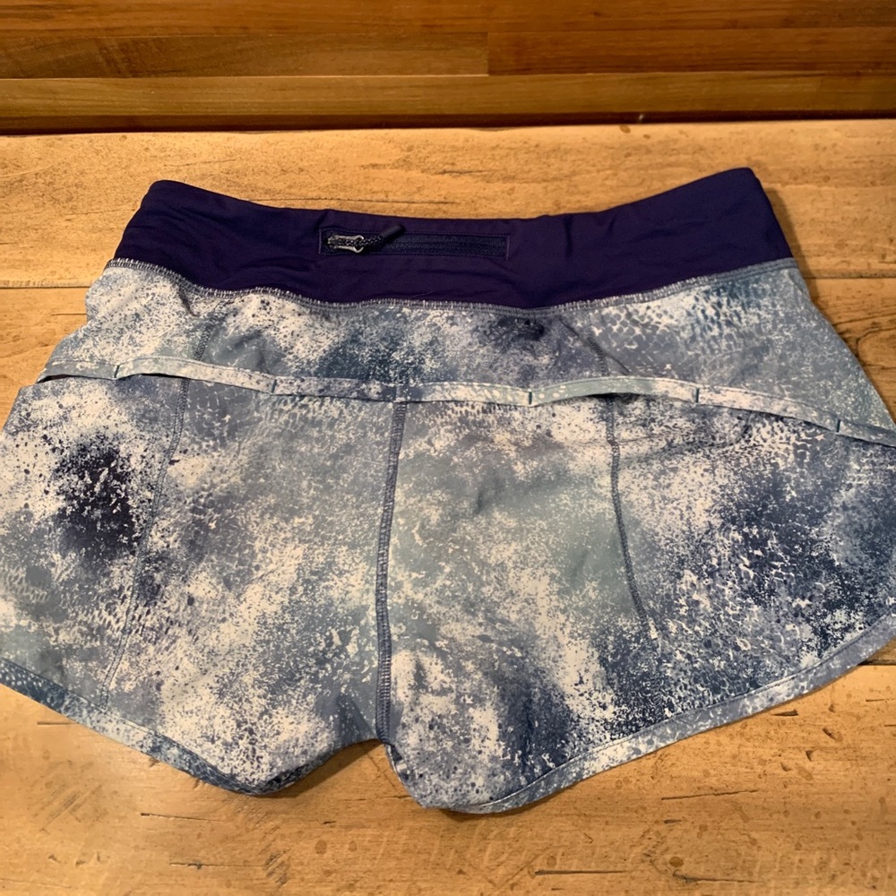 Ivivia blue and white speckled shorts